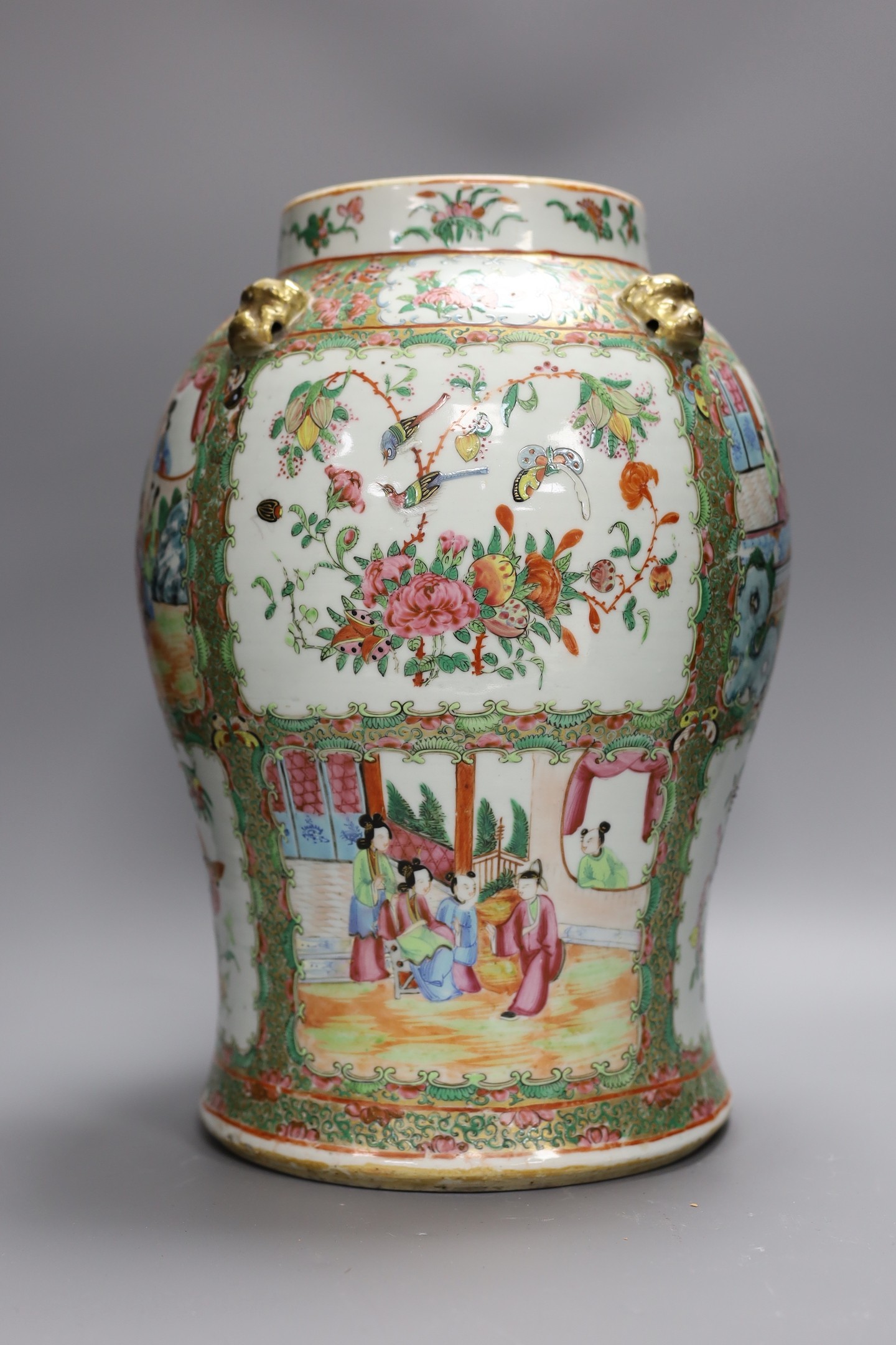 A large Chinese Canton decorated famille rose jar, 19th century, 39 cms high